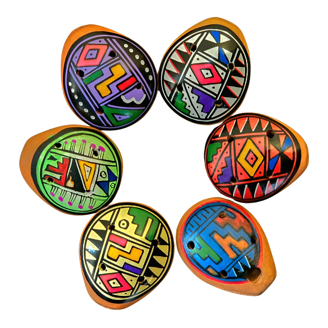 Small ocarina ceramic whistle with colorful Shipibo and geometric designs - made by a Peruvian Amazon artisan - Amazon Ecology