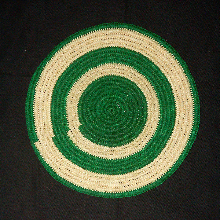 Woven hot pad (trivet) and center piece with green and white rings - Amazon Ecology