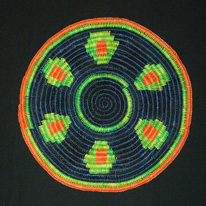 Woven hot pad (trivet) and center piece with tree figures on navy blue - Amazon Ecology