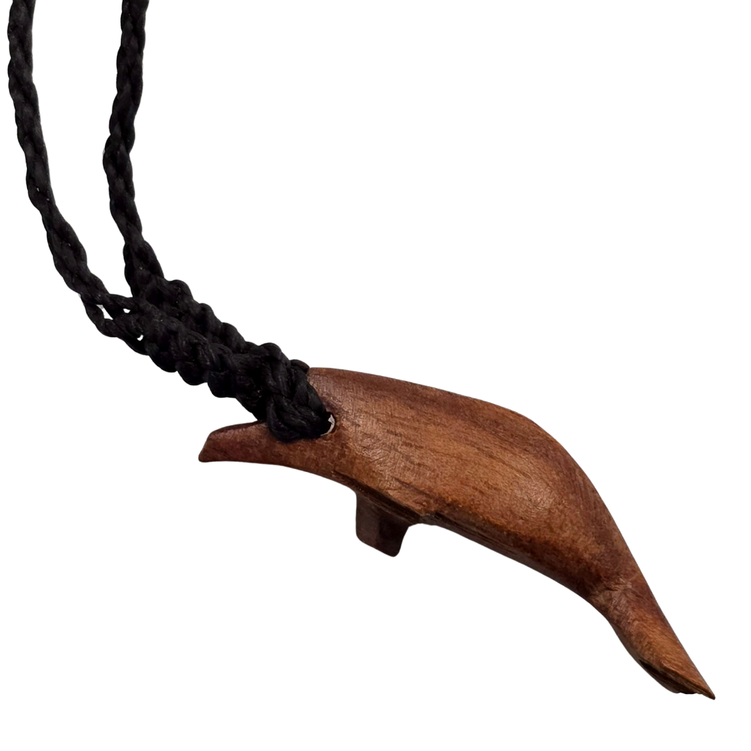Carved tagua and palo sangre dolphin necklaces - made by artisans from the Peruvian Amazon