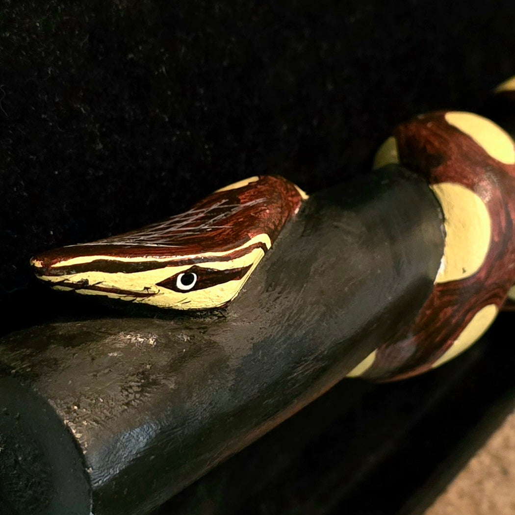 Wooden tropical snake on branch decoration - made by Peruvian Amazon artisan - Amazon Ecology