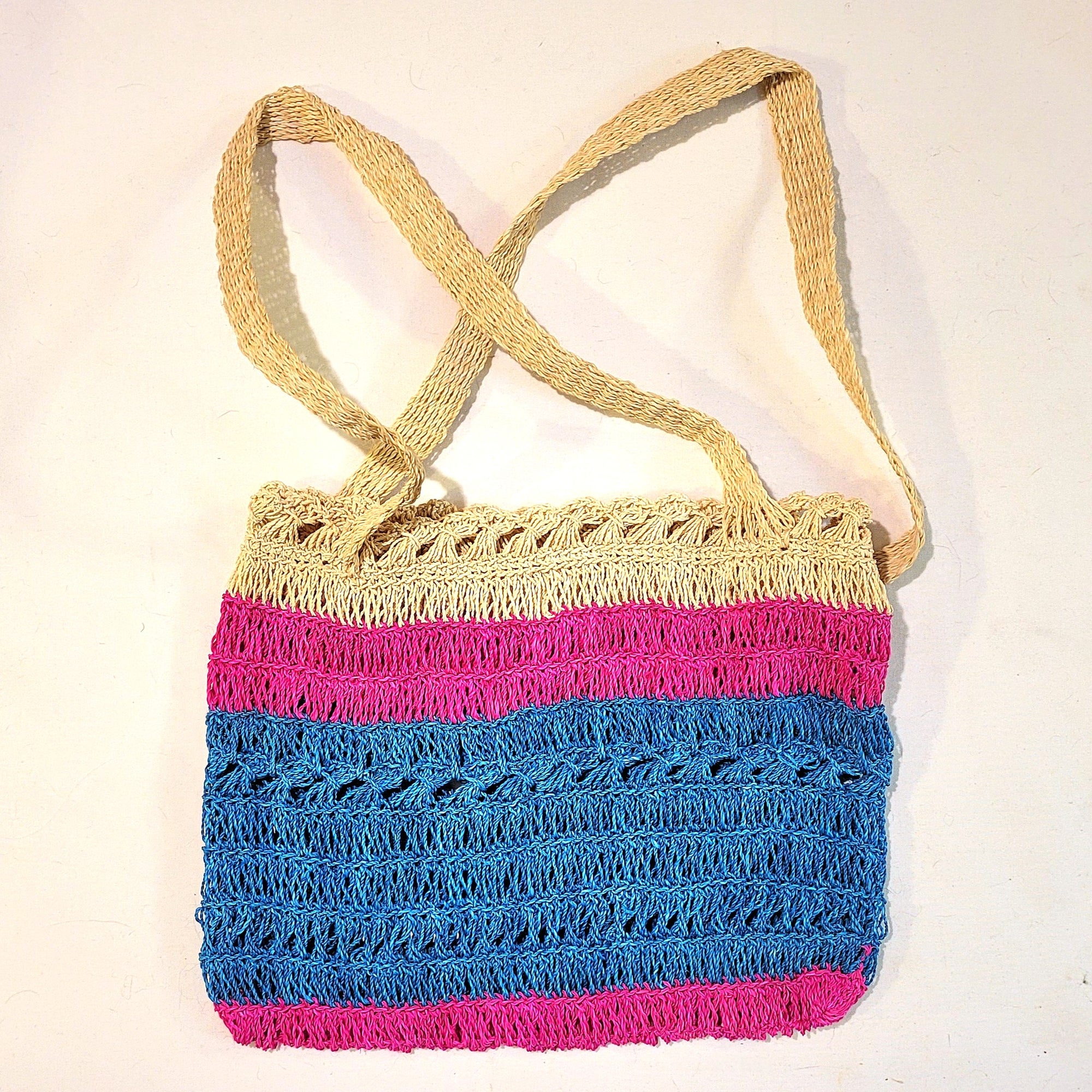 Fancy ivory, pink and turquoise crochet fair trade chambira market bag made by Peruvian Amazon artisan
