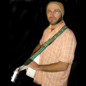 GS10A: David Imburgia with Amazon guitar strap - emerald tree boa model