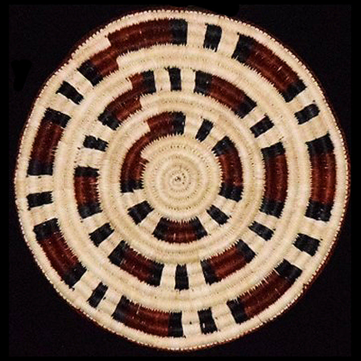 Woven hot pad (trivet) and center piece with red and black bands - Amazon Ecology