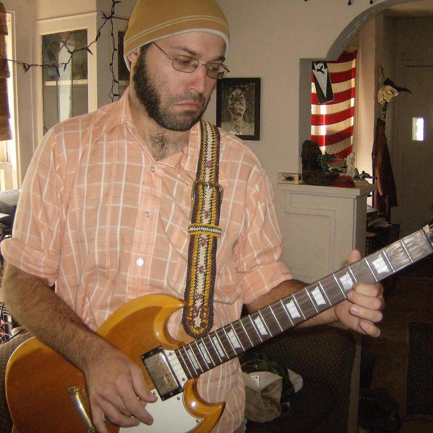 GS06A: David Imburgia with Amazon guitar strap at home - bushmaster model